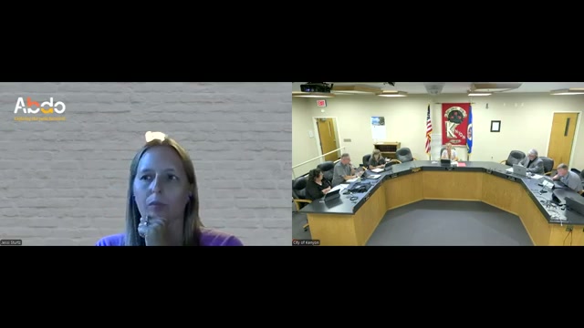 The recording at 56:53: the Zoom gallery, with the council chamber camera in the right-hand tile.