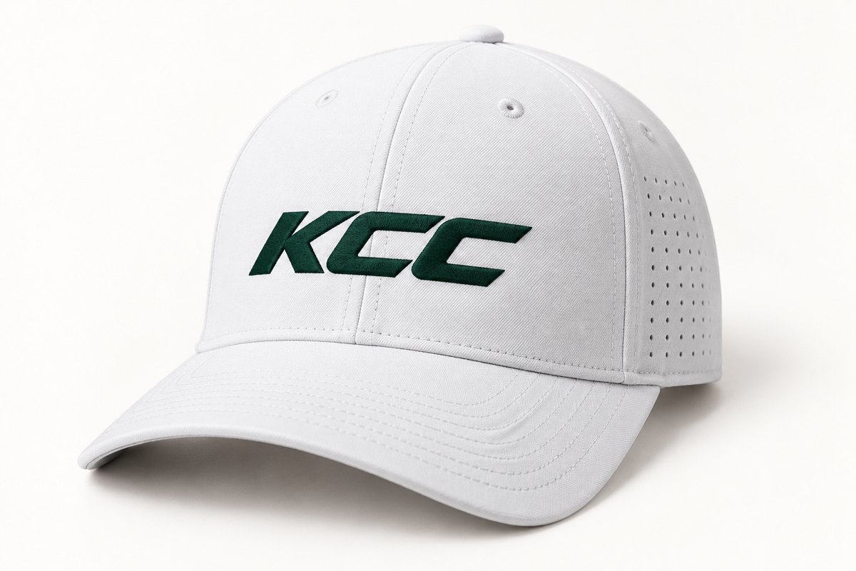 A white cap with the KCC wordmark embroidered in green