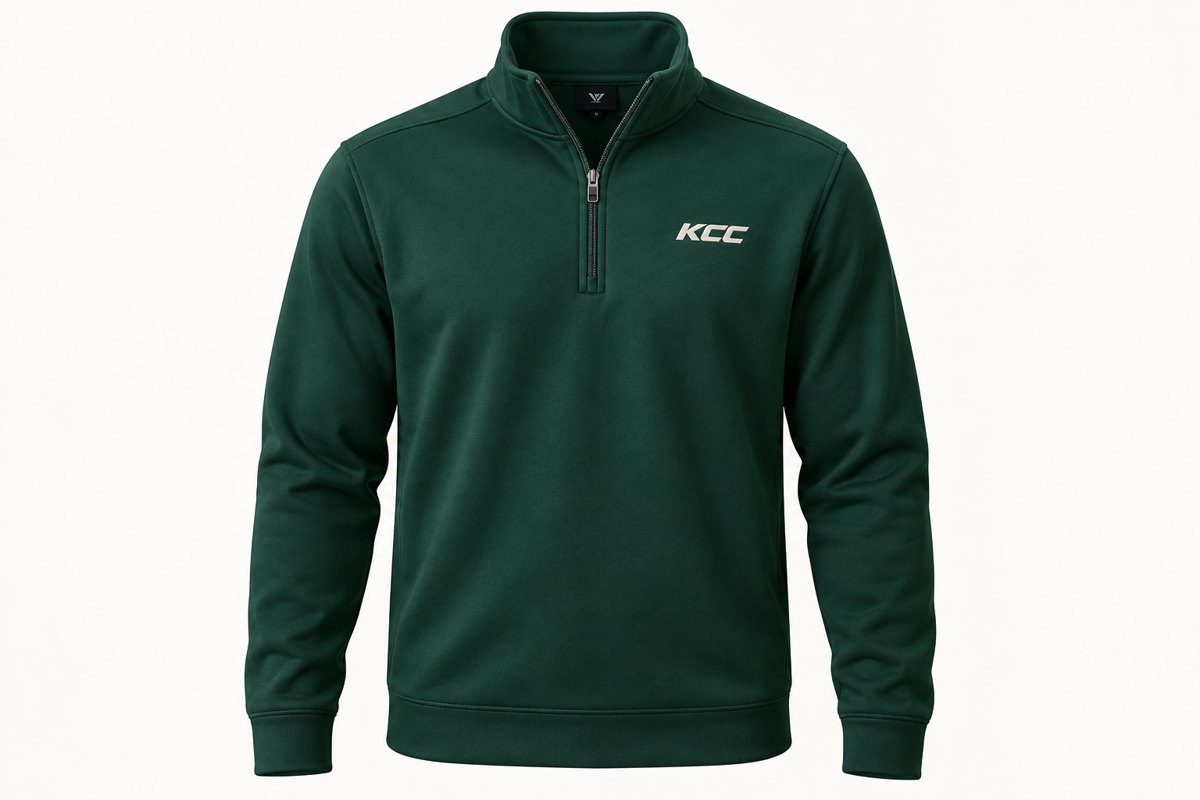 The quarter-zip: Deep green, KCC on the left chest.